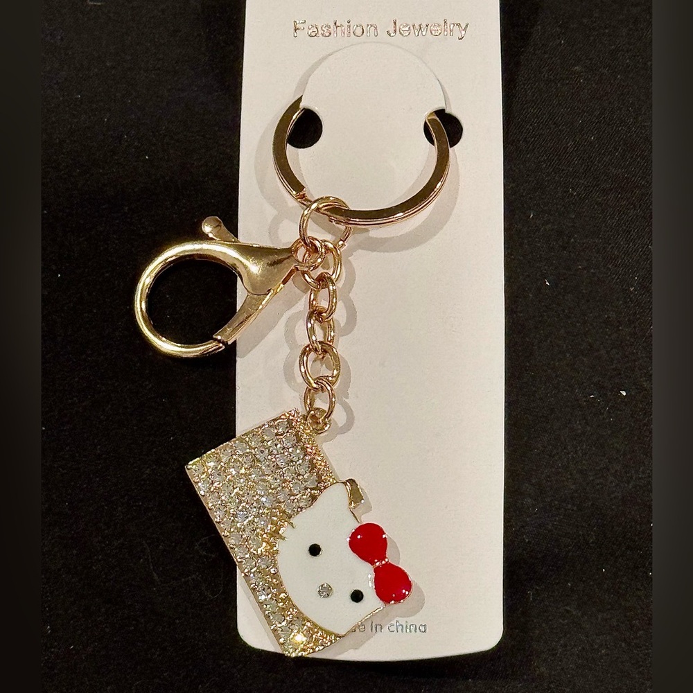 BAG CHARM Gold Tone Red Bow Hello Kitty Sparkly Purse Keychain